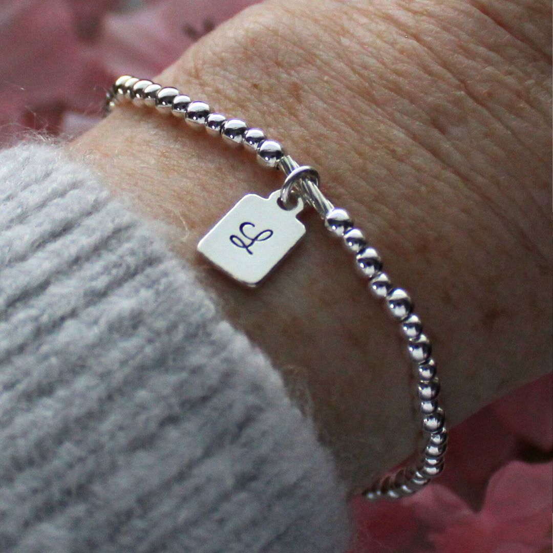 Sterling Silver Stacking Bracelet with Initial Charm – Isla Love Drop
