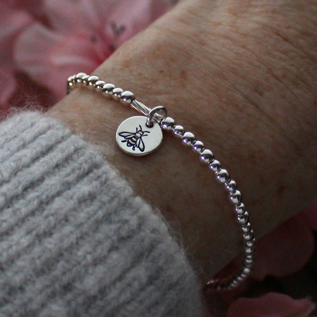 Sterling Silver Stacking Bracelet with Bee Charm – Mia Love Drop