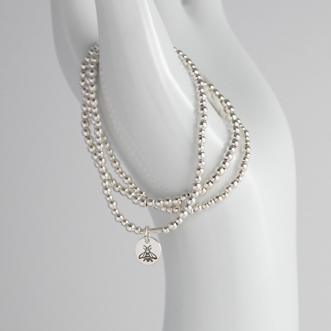 Sterling Silver Stacking Bracelet with Bee Charm – Mia Love Drop