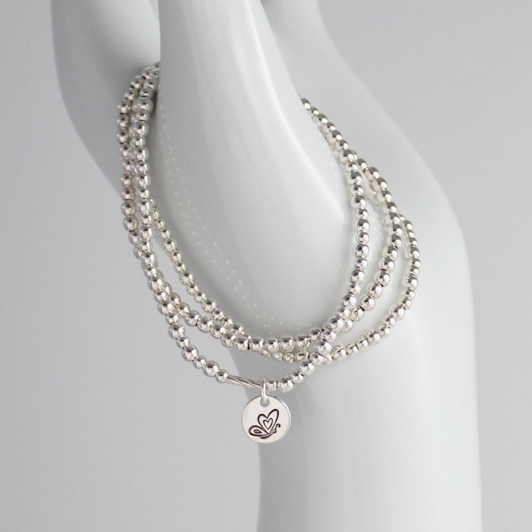 Sterling Silver Stacking Bracelet with Butterfly Charm – Mia Love Drop