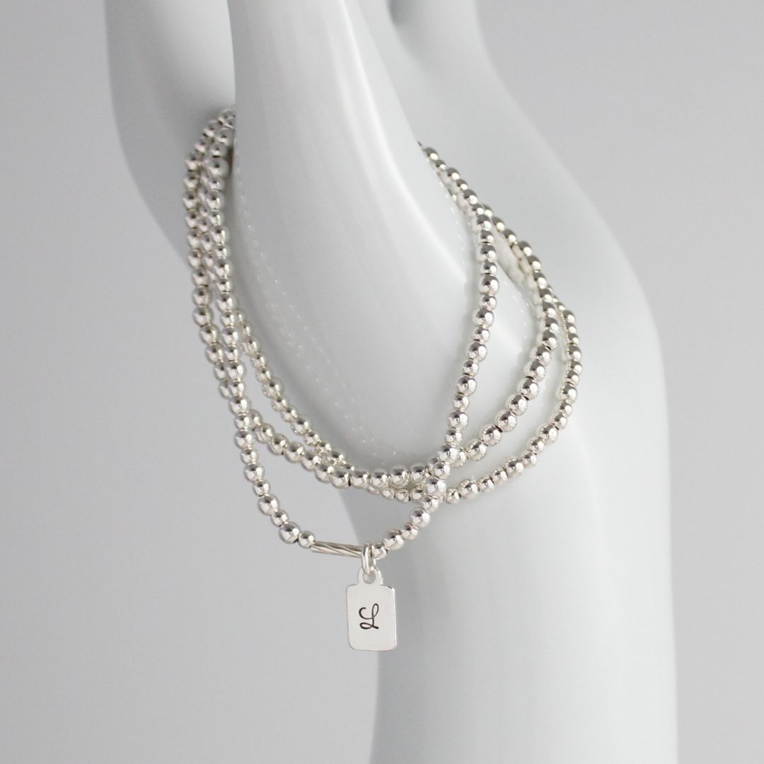 Sterling Silver Stacking Bracelet with Initial Charm – Isla Love Drop