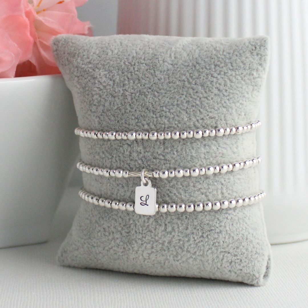 Sterling Silver Stacking Bracelet with Initial Charm – Isla Love Drop