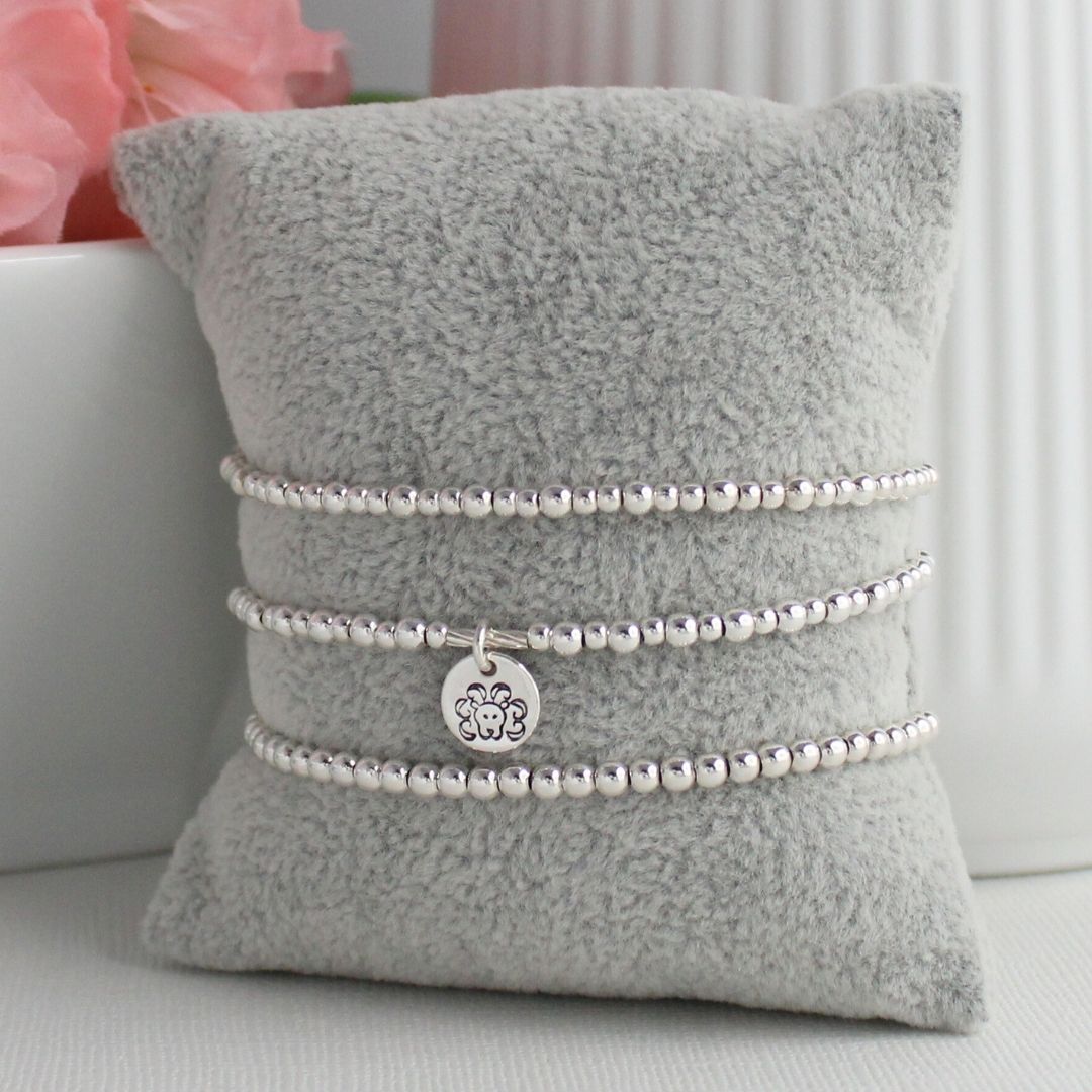 Sterling Silver Stacking Bracelet with Zodiac Charm – Mia Love Drop
