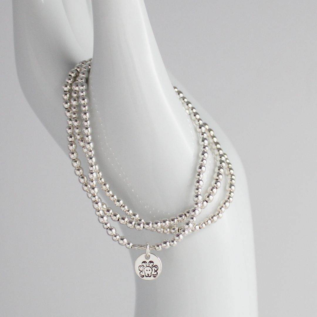 Sterling Silver Stacking Bracelet with Zodiac Charm – Mia Love Drop