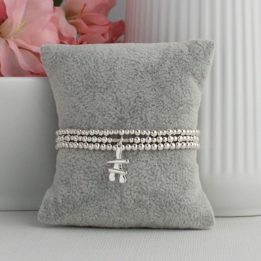 Inukshuk Charm Beaded Stacking Bracelet