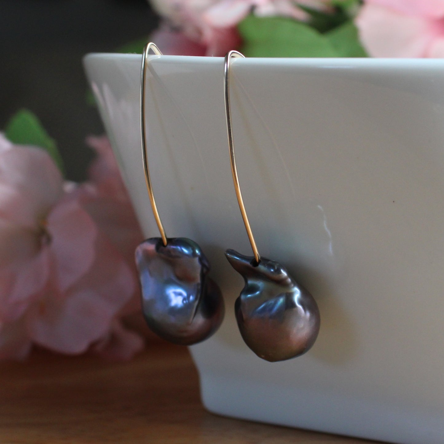 handcrafted baroque pearl earrings. large baroque peacock pearls. gold filled long ear wires.