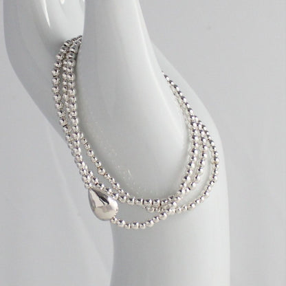 Silver Hammered Pear-Shaped Focal Bead Stacking Bracelet - Amalfi