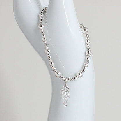 Angel Wing Charm Beaded Stacking Bracelet - Caroline